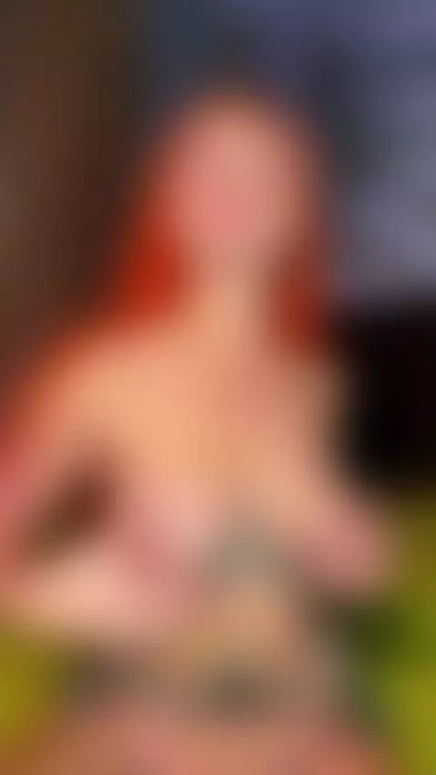 Tattooed redhead showing off her huge tits and open pleasure... by touchmylips
