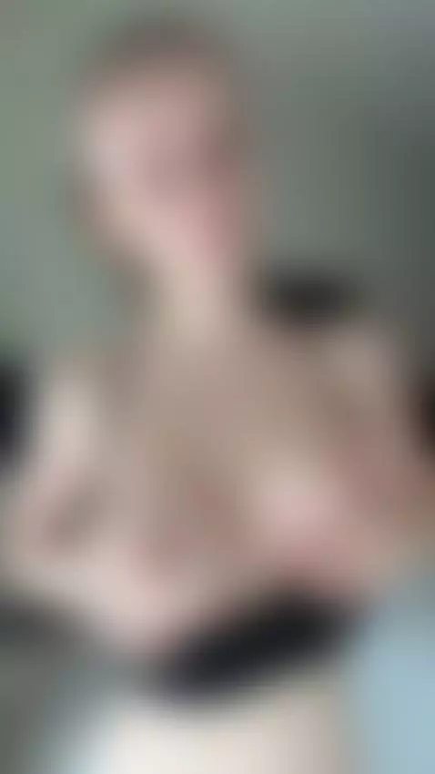 Curly blonde slowly revealing her big tits and smiling. Full... by elmoongirl