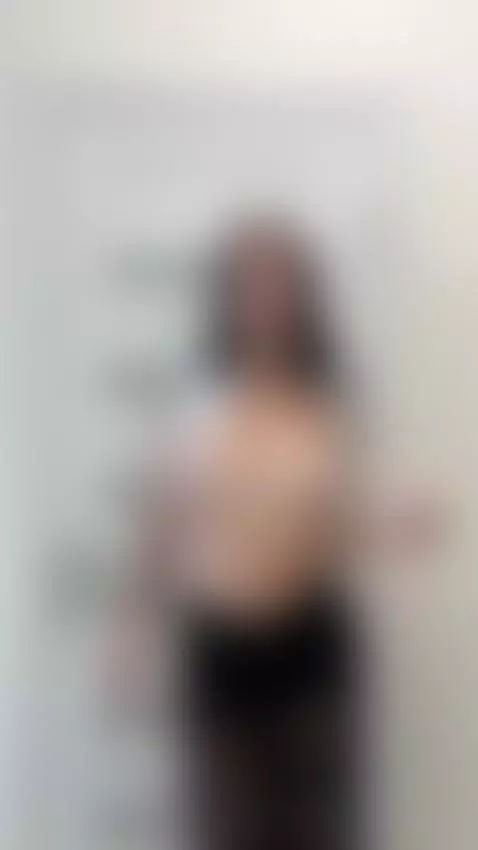 Zip pulled down, top falling open, tits out for the strip. G... by lollahoney