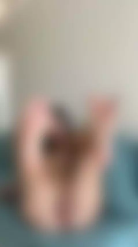 Soles pointed straight at the lens, fully open on the couch.... by lollahoney