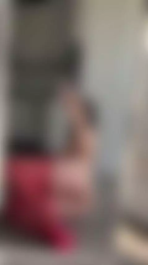 Kneeling in red fishnet stockings taking selfie 🔥 full tease... by valenciasoul