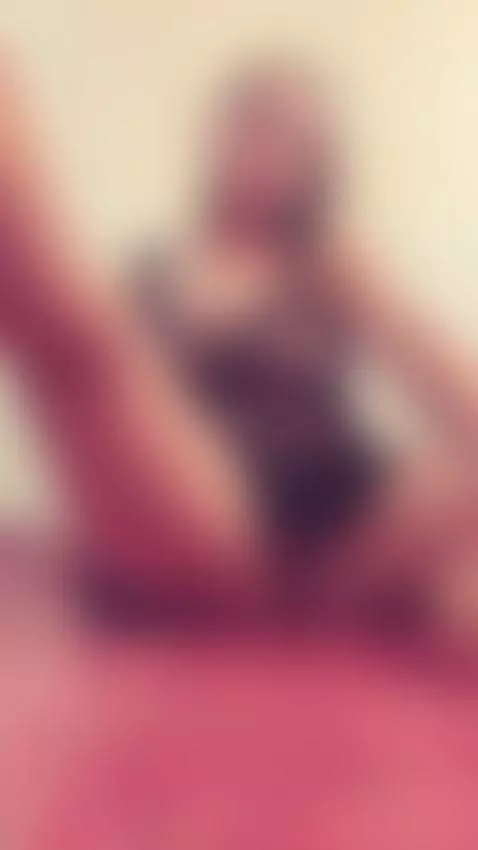 Blonde beauty in sheer black lace teasing with a dildo on th... by liasecrett