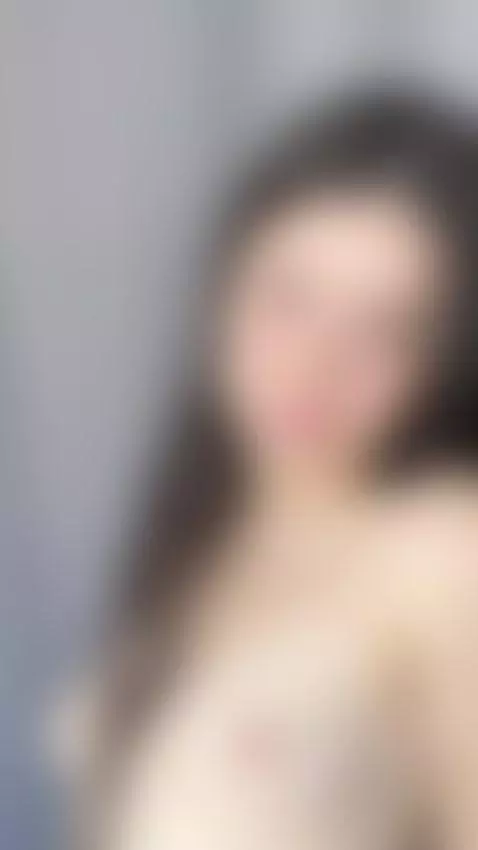 Natural brunette teasing and showing off her bare chest by creamysin