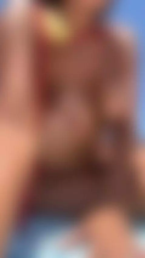 Oiled latina babe teasing her massive natural tits in the su... by officialrinaxo