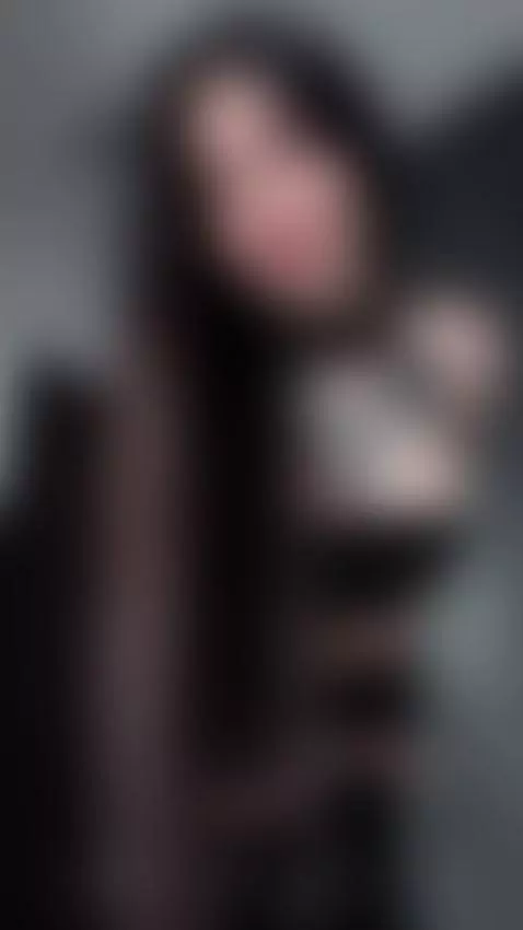 Tattooed girl in black leather smirks and leans in close 🔥 by femdommissdi