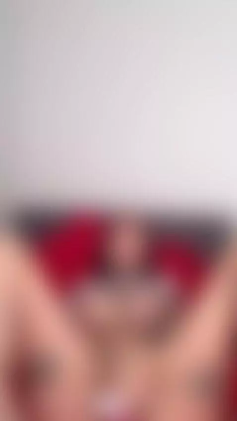 Rubbing a vibrator hard against her wet pussy while lying sp... by ohhnaomi