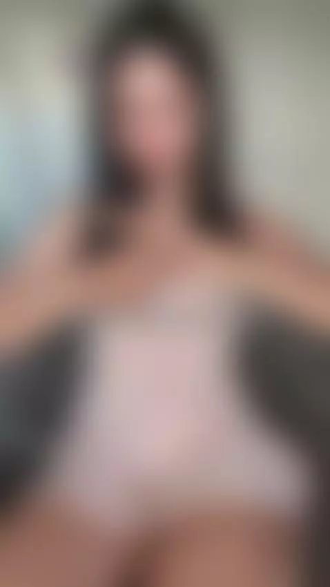Trans girl teases with her fingers near her lips by sofits