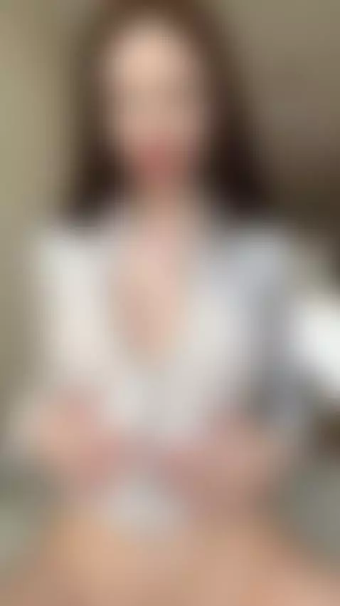 Brunette girl teasing in a zipped hoodie, slowly revealing h... by candyhere