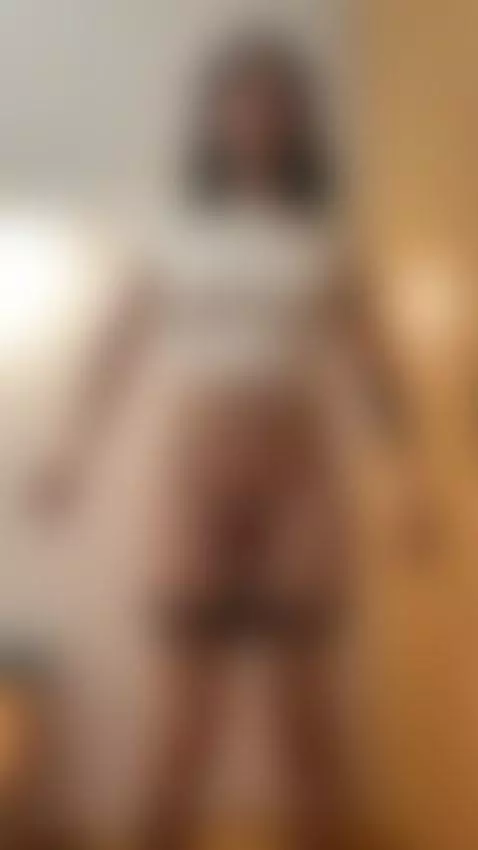 Trans girl stands bare with cock out, hands on hips by femmbaby