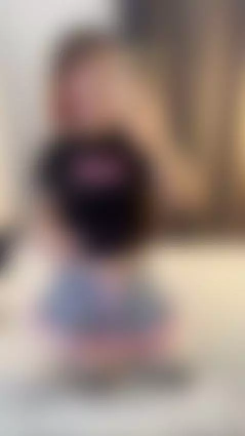 Trans girl kneels on bed, hand on hip, snapping her mirror s... by femmbaby